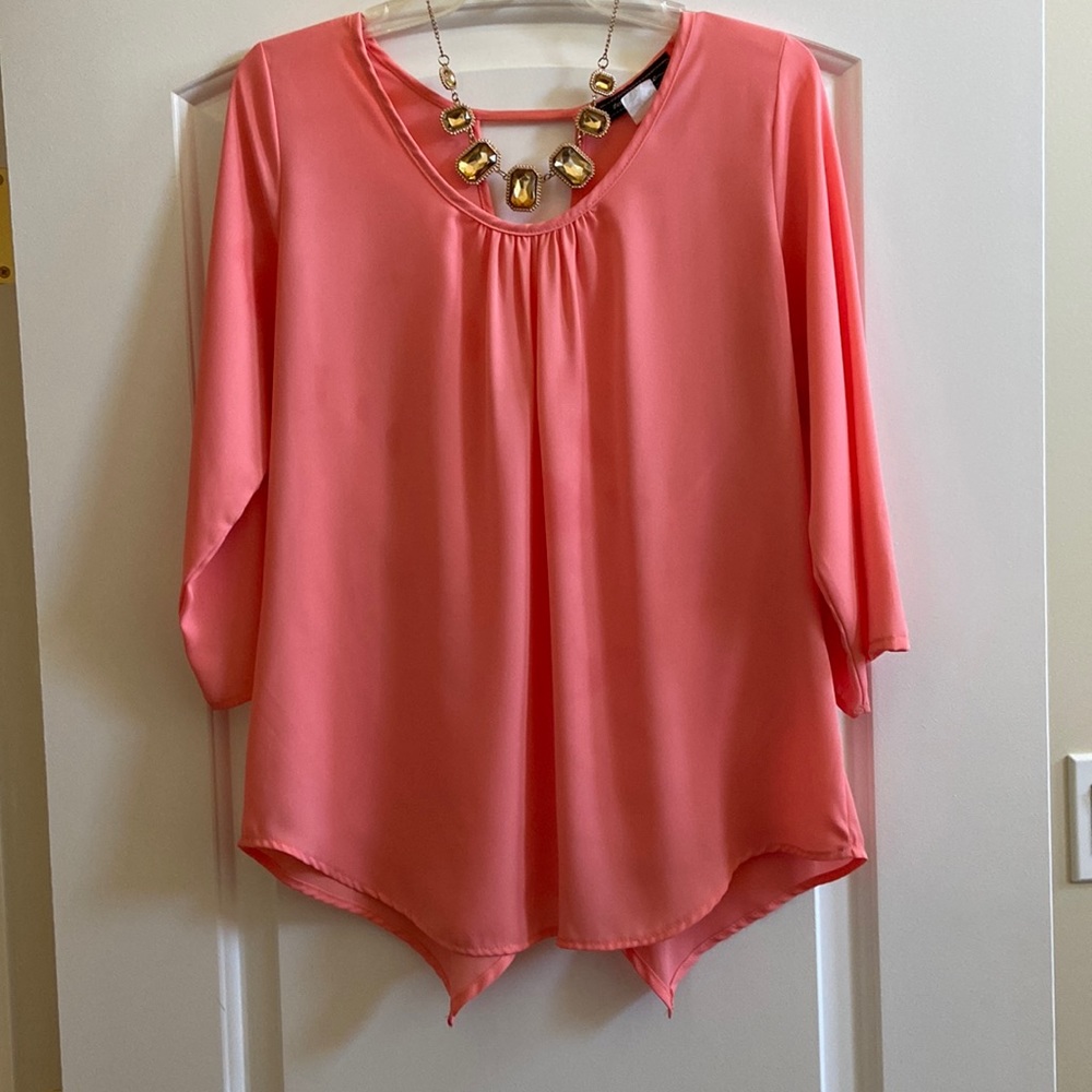 Gently used coral polyester top in size M